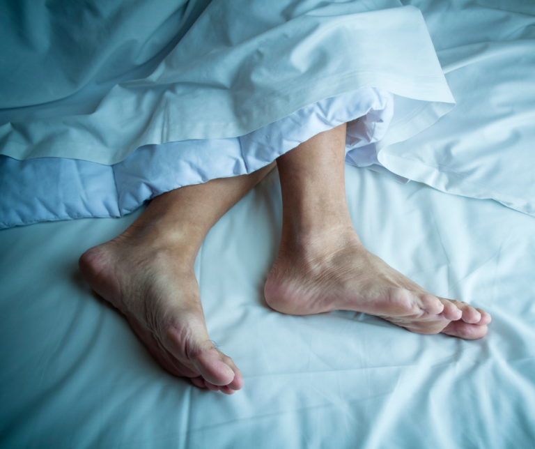 feet in bed at night