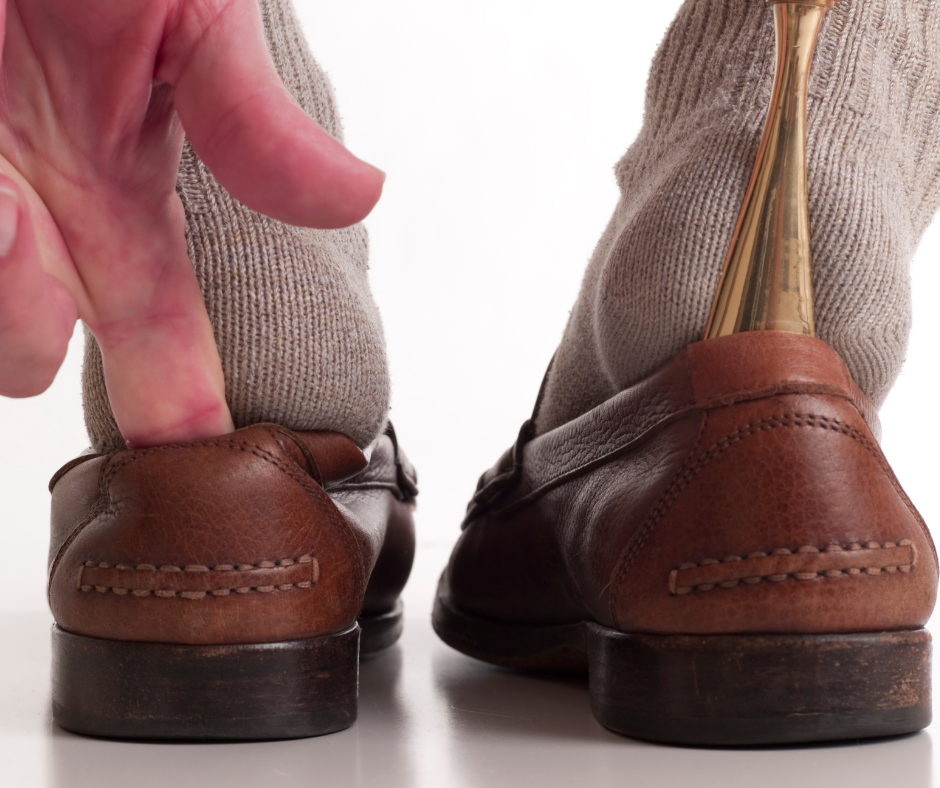 Can Your Shoe Size Change as You Get Older? 1 person fitting into shoes